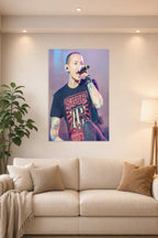 Chester Bennington in a bright living room above a beige sofa.