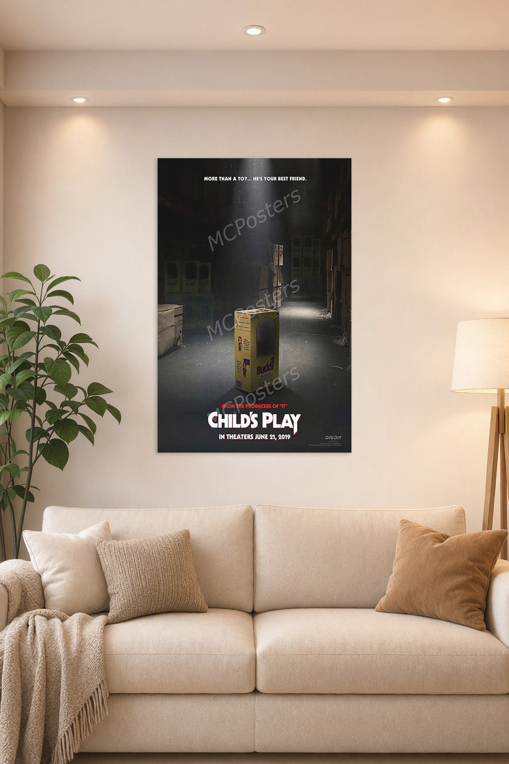 Child's Play Chucky Movie Poster in a bright living room above a beige sofa.