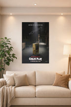 Child's Play Chucky Movie Poster in a bright living room above a beige sofa.