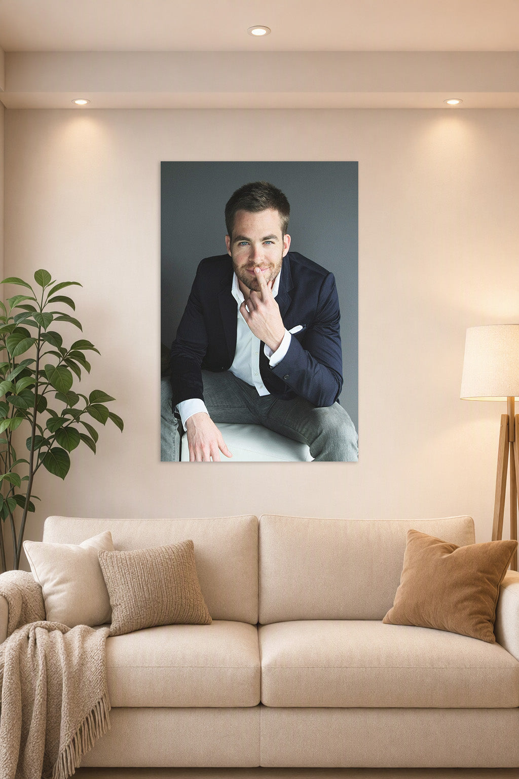 Chris Pine in a bright living room above a beige sofa.