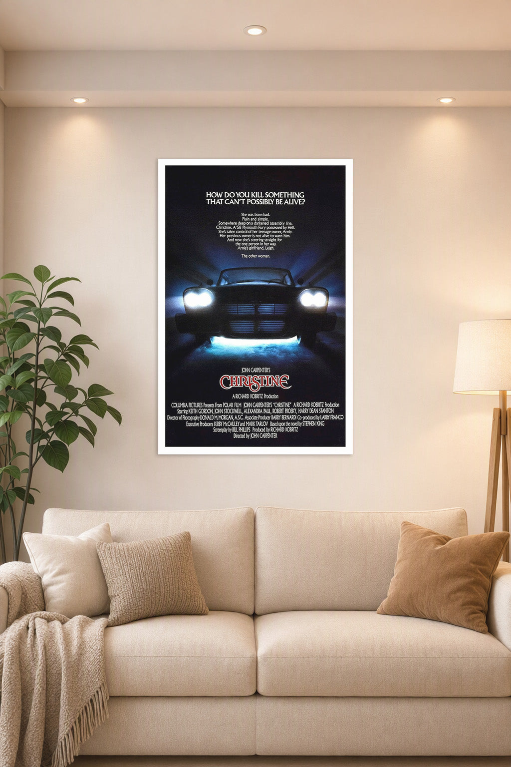Christine (1983) Movie Poster in a bright living room above a beige sofa.