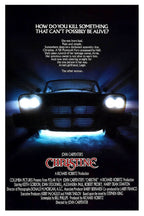 Christine movie poster wall art print features a black vintage car head-on with glowing headlights in blue mist.