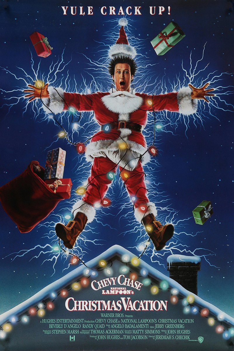 Christmas Vacation poster features Clark Griswold in a red Santa suit, tangled in glowing lights and lightning above a snowy roof.