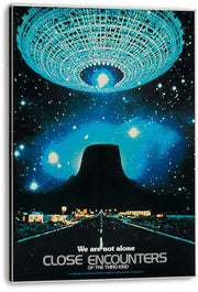 Close Encounters of the Third Kind wall art print on a stretched canvas, with a luminous UFO over Devil's Tower and starry blue sky.