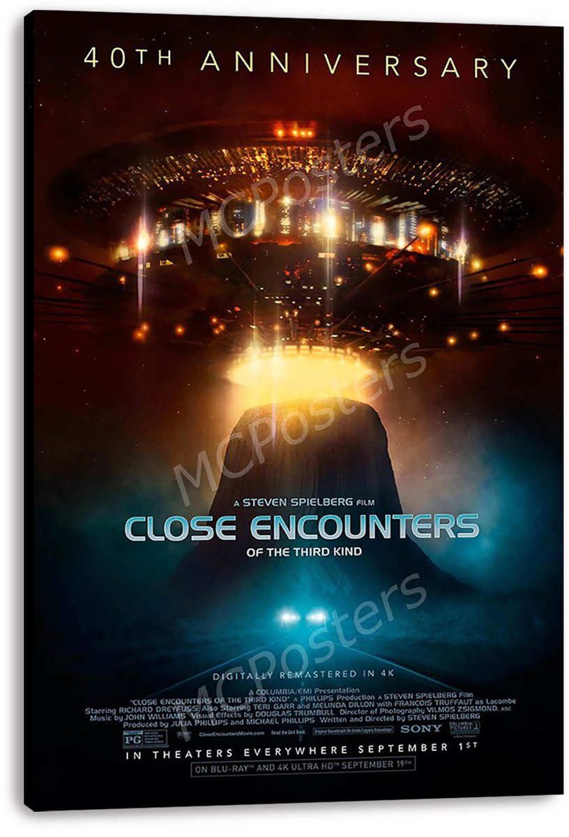 Close Encounters of the Third Kind wall art print on a wrapped canvas depicts a luminous UFO hovering over Devil's Tower.