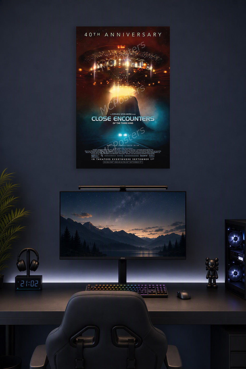 Close Encounters of the Third Kind Movie in a gaming desk setup above a monitor.