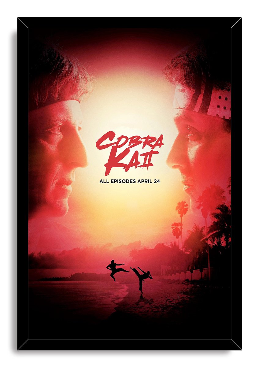 Cobra Kai framed wall art print featuring two men facing each other over a sunset beach with martial arts silhouettes.