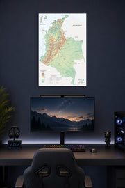Colombia Physical-Political Map in a gaming desk setup above a monitor.