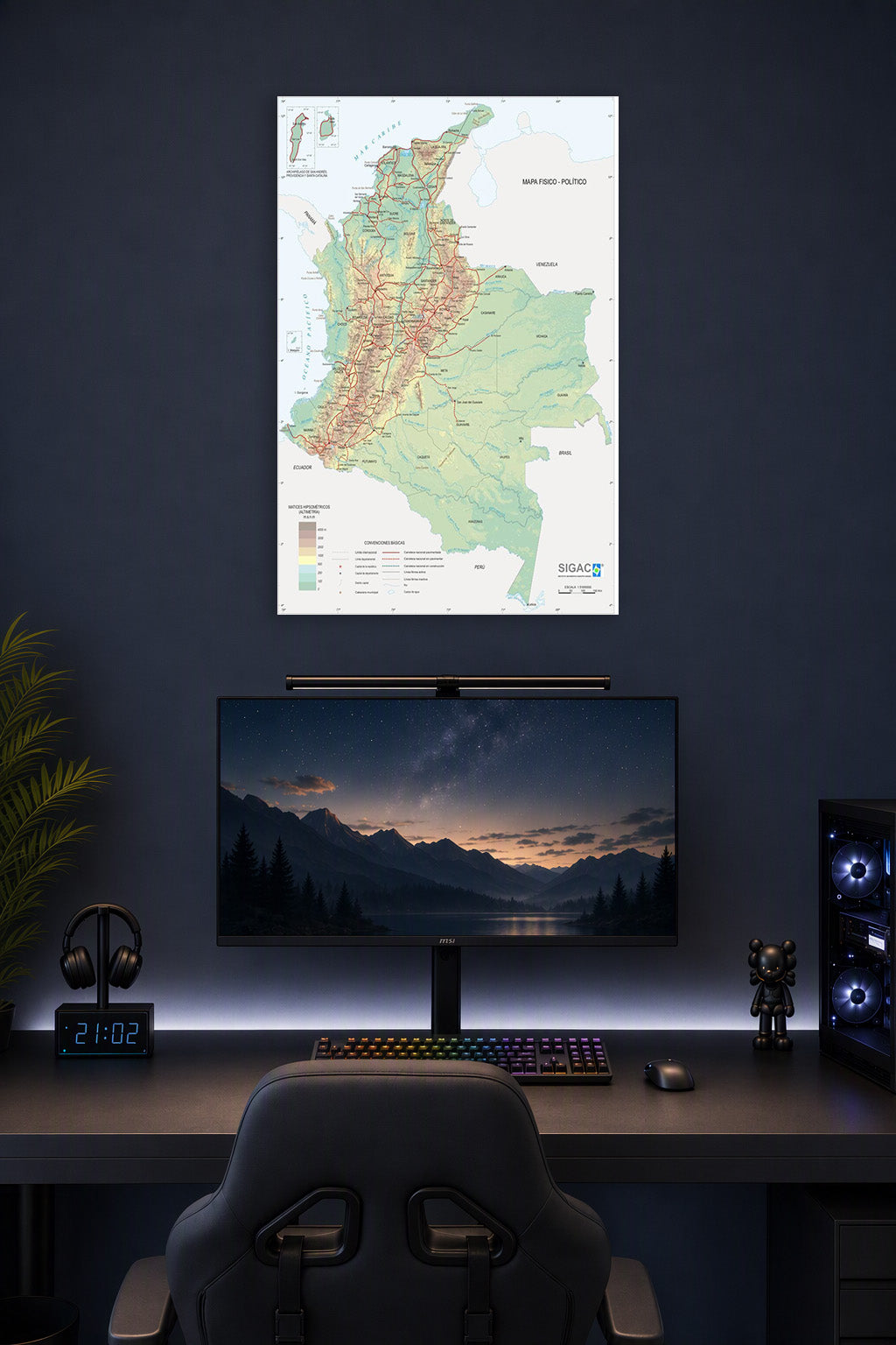 Colombia Physical-Political Map in a gaming desk setup above a monitor.