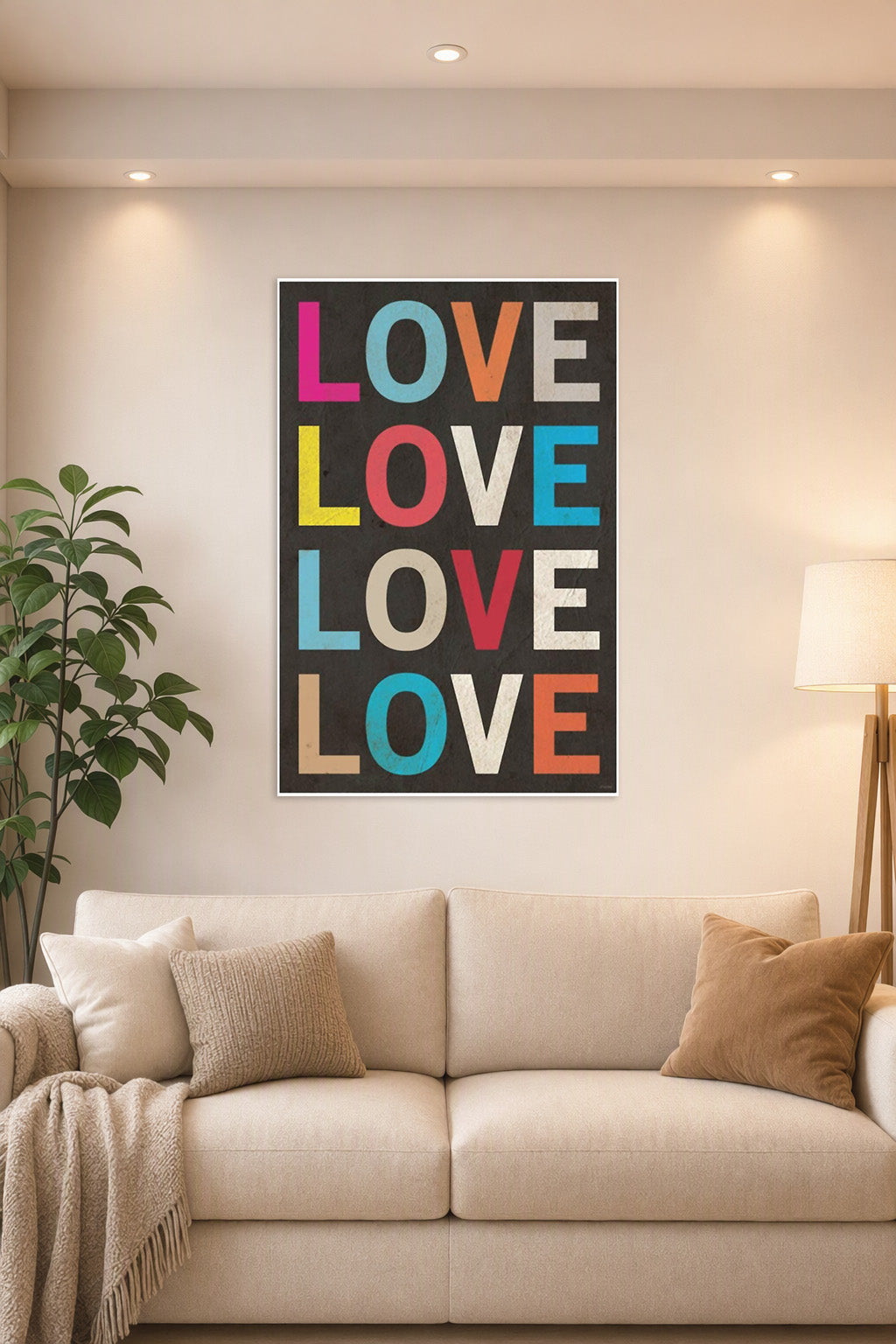 Colorful LOVE Text in a bright living room above a beige sofa.