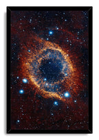 Helix Nebula framed wall art print features a luminous orange circular nebula with a dark blue core against a densely starry sky.