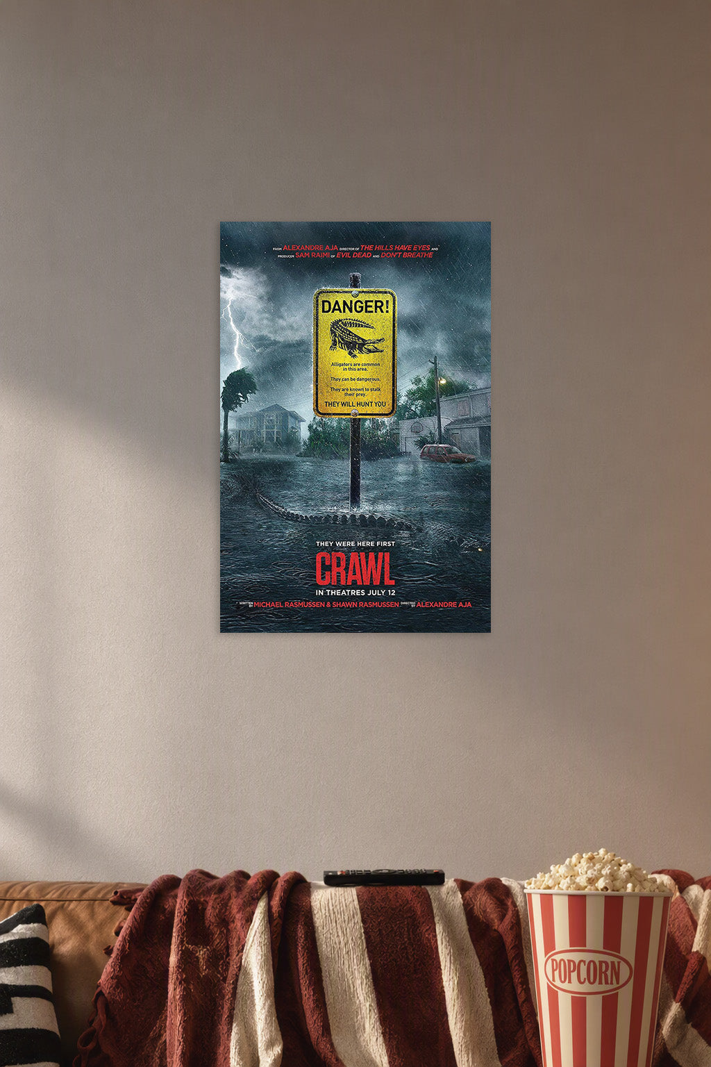 Crawl Movie Alligator Horror Flood in a cozy movie room above a brown sofa with popcorn.