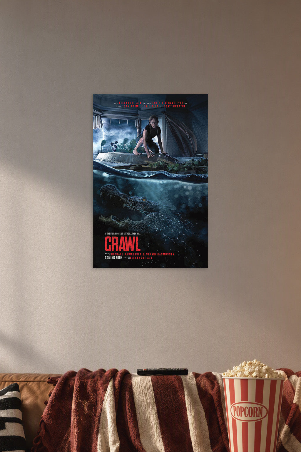 Crawl Movie in a cozy movie room above a brown sofa with popcorn.
