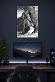 Creature From The Black Lagoon in a gaming desk setup above a monitor.