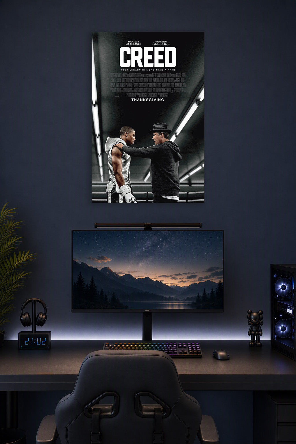 Creed Movie Michael B. Jordan Sylvester Stallone in a gaming desk setup above a monitor.