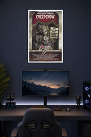 Creepshow Movie Poster in a gaming desk setup above a monitor.