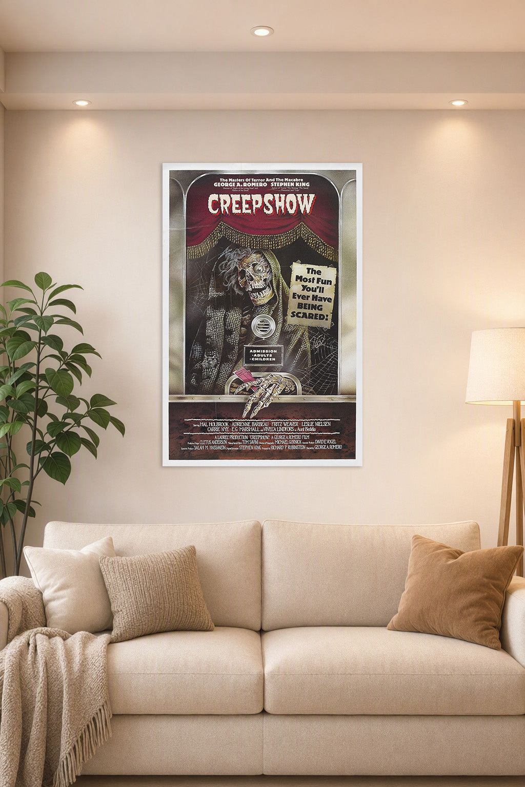 Creepshow Movie Poster in a bright living room above a beige sofa.