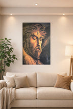 Crucifixion of Jesus in a bright living room above a beige sofa.