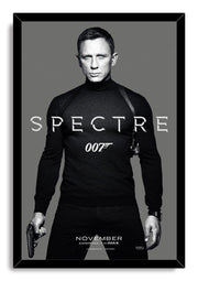 James Bond Spectre framed wall art print portrays Daniel Craig holding a pistol beneath silver Spectre lettering on gray.