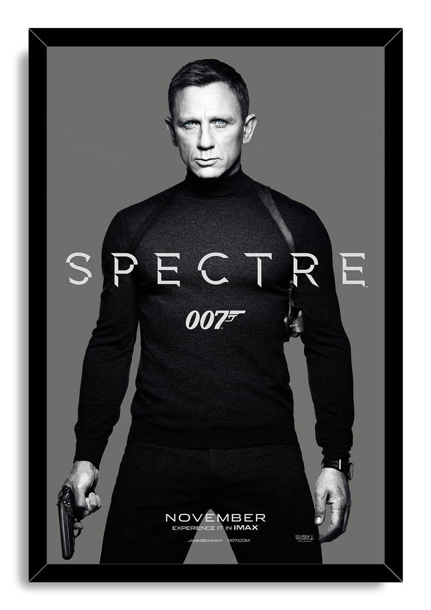 James Bond Spectre framed wall art print portrays Daniel Craig holding a pistol beneath silver Spectre lettering on gray.
