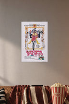 Darktown Strutters Blaxploitation Movie Poster in a cozy movie room above a brown sofa with popcorn.