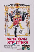 Darktown Strutters poster features a woman riding a red trike, motorcycles, two dancers in white, and gold scrollwork.