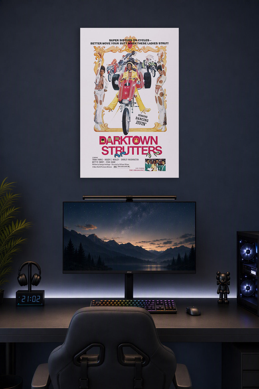 Darktown Strutters Movie Poster in a gaming desk setup above a monitor.
