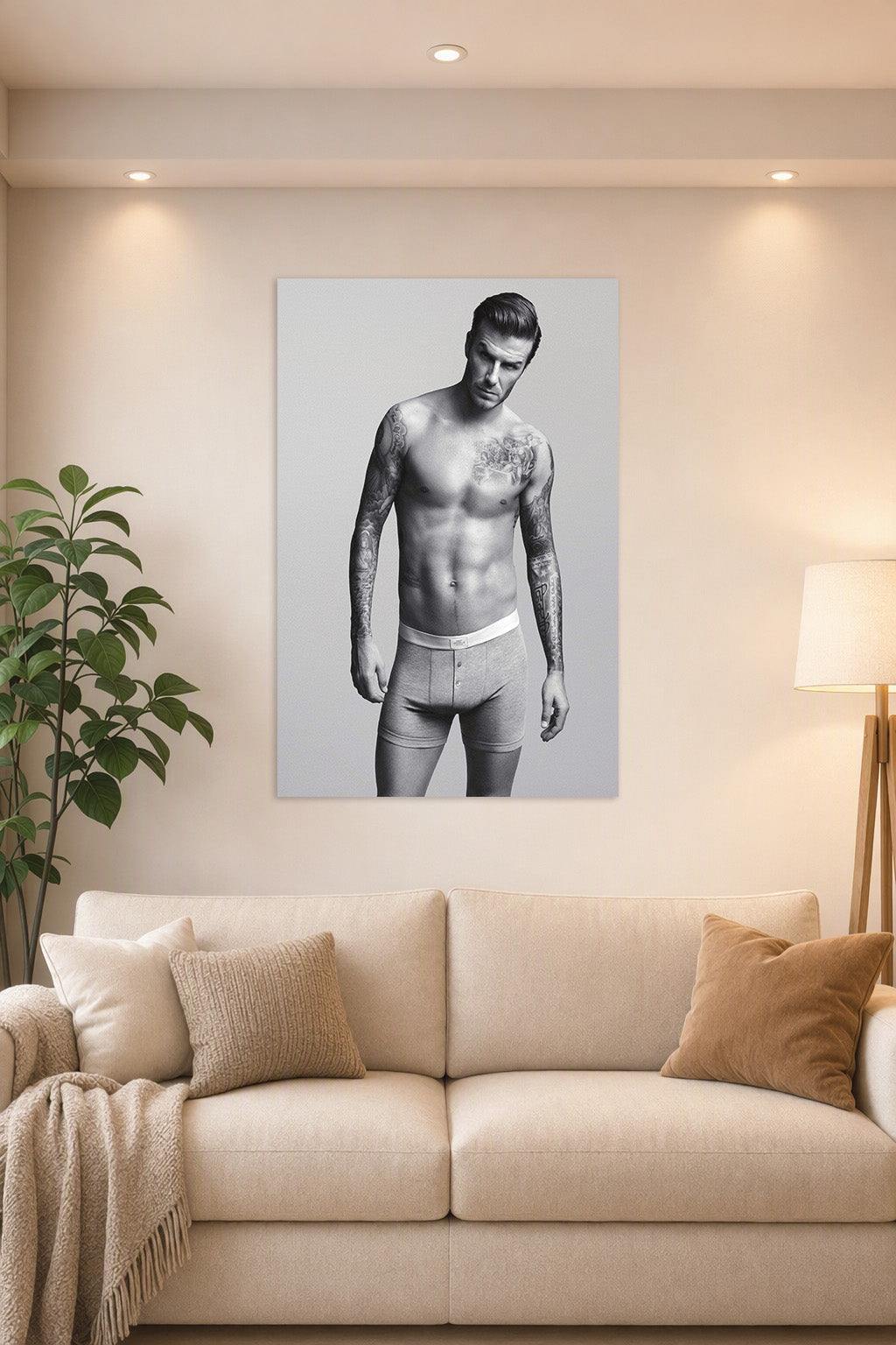 David Beckham in a bright living room above a beige sofa.