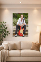 David Cassidy in a bright living room above a beige sofa.