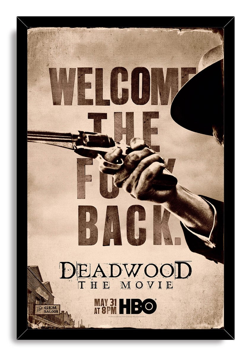 Deadwood The Movie framed wall art print in a black frame, with a cowboy aiming a revolver against vintage sepia lettering.