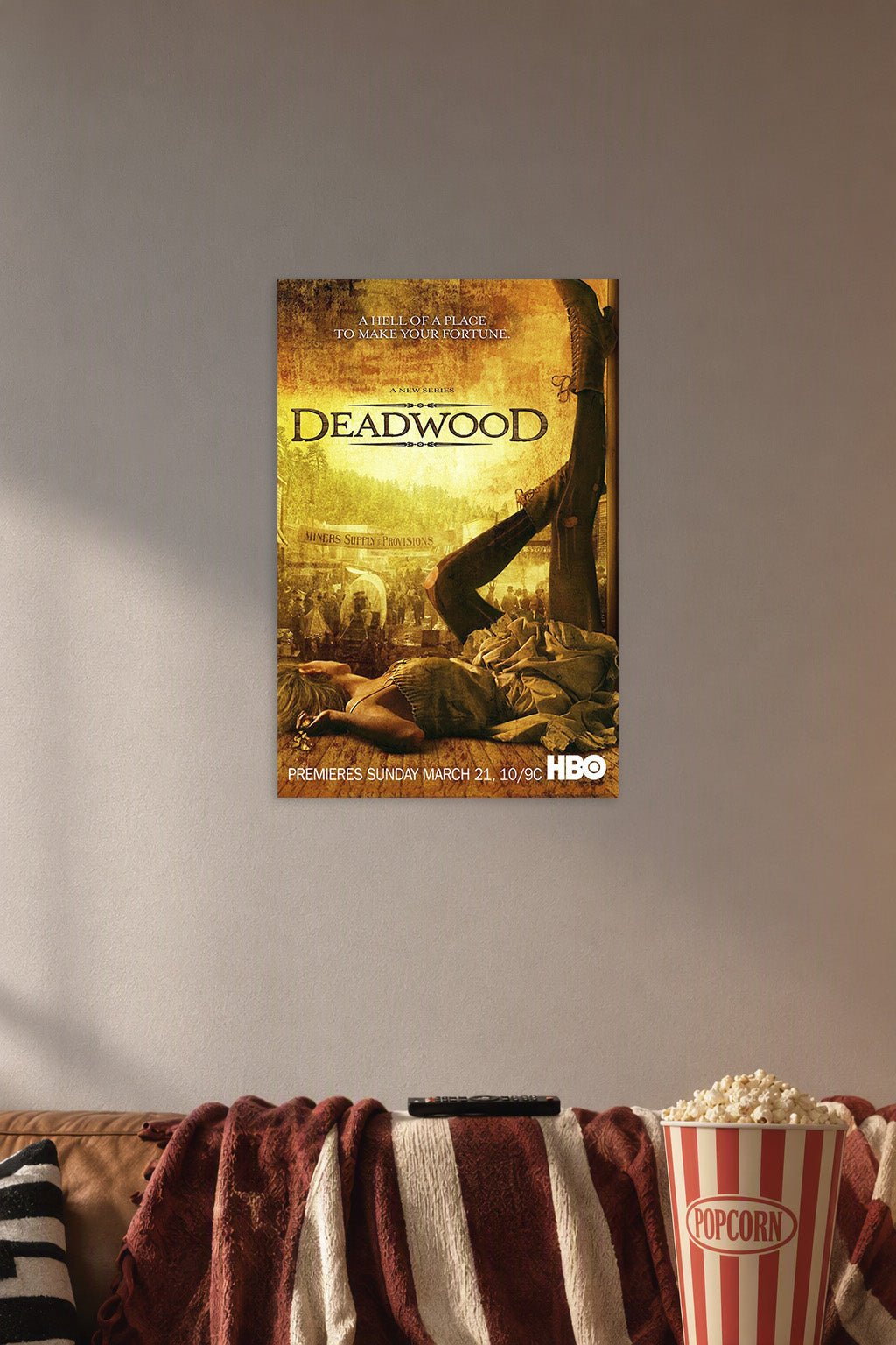 Deadwood Western TV Series in a cozy movie room above a brown sofa with popcorn.