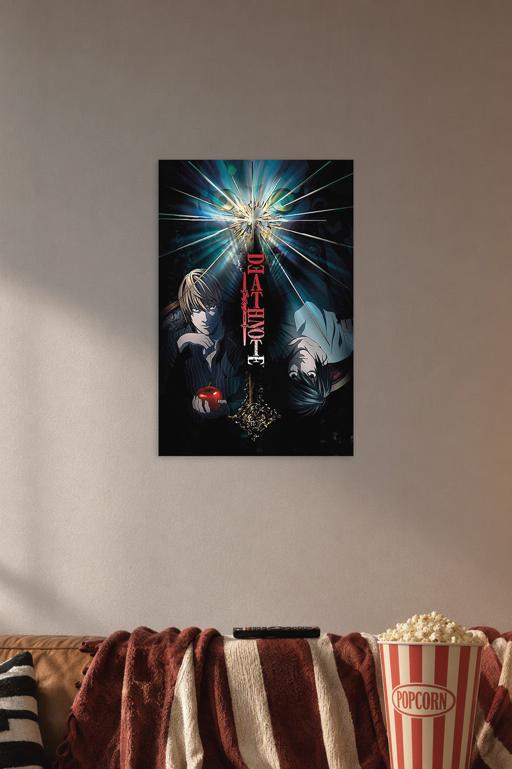 Death Note Light Yagami and L Lawliet in a cozy movie room above a brown sofa with popcorn.