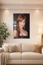 Debby Ryan in a bright living room above a beige sofa.