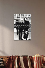 Depeche Mode in a cozy movie room above a brown sofa with popcorn.