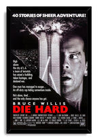 Die Hard framed wall art print presents Bruce Willis beside an exploding skyscraper, with white typography and a bold red title.