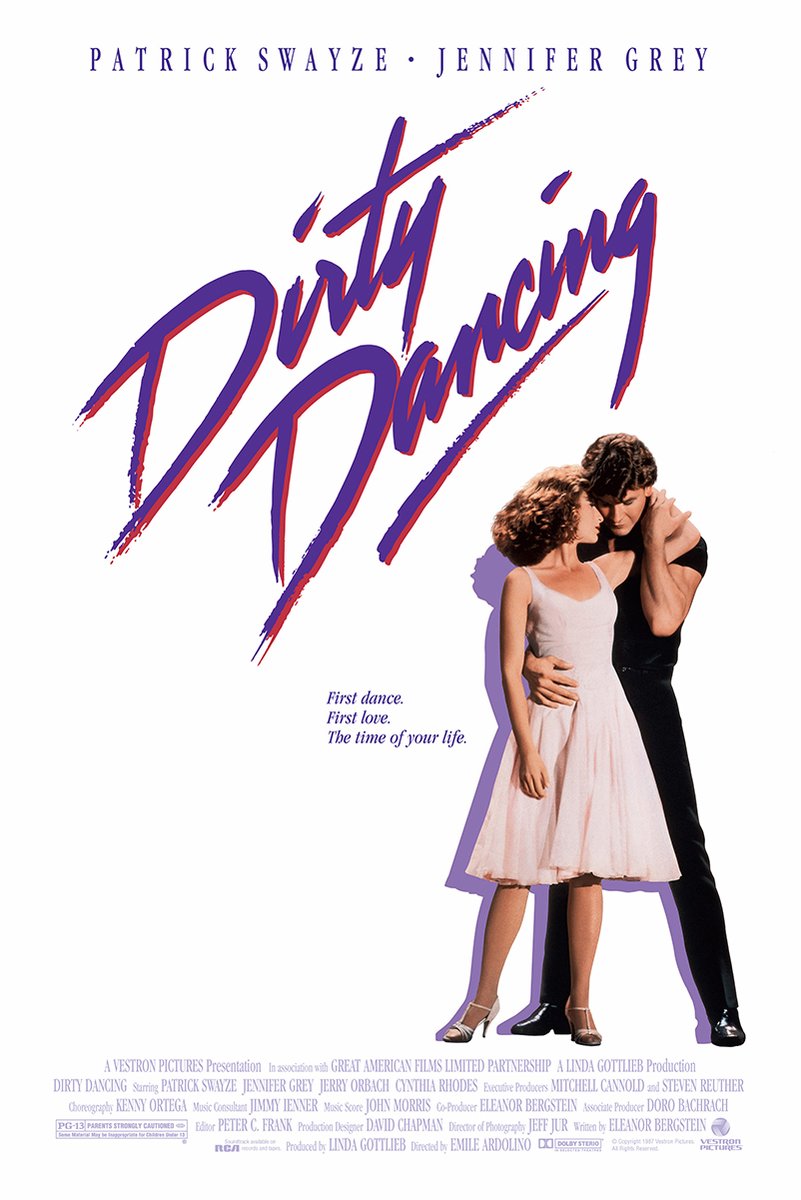 Dirty Dancing poster with purple and red script title and a couple embracing, she in pale pink and he in black.