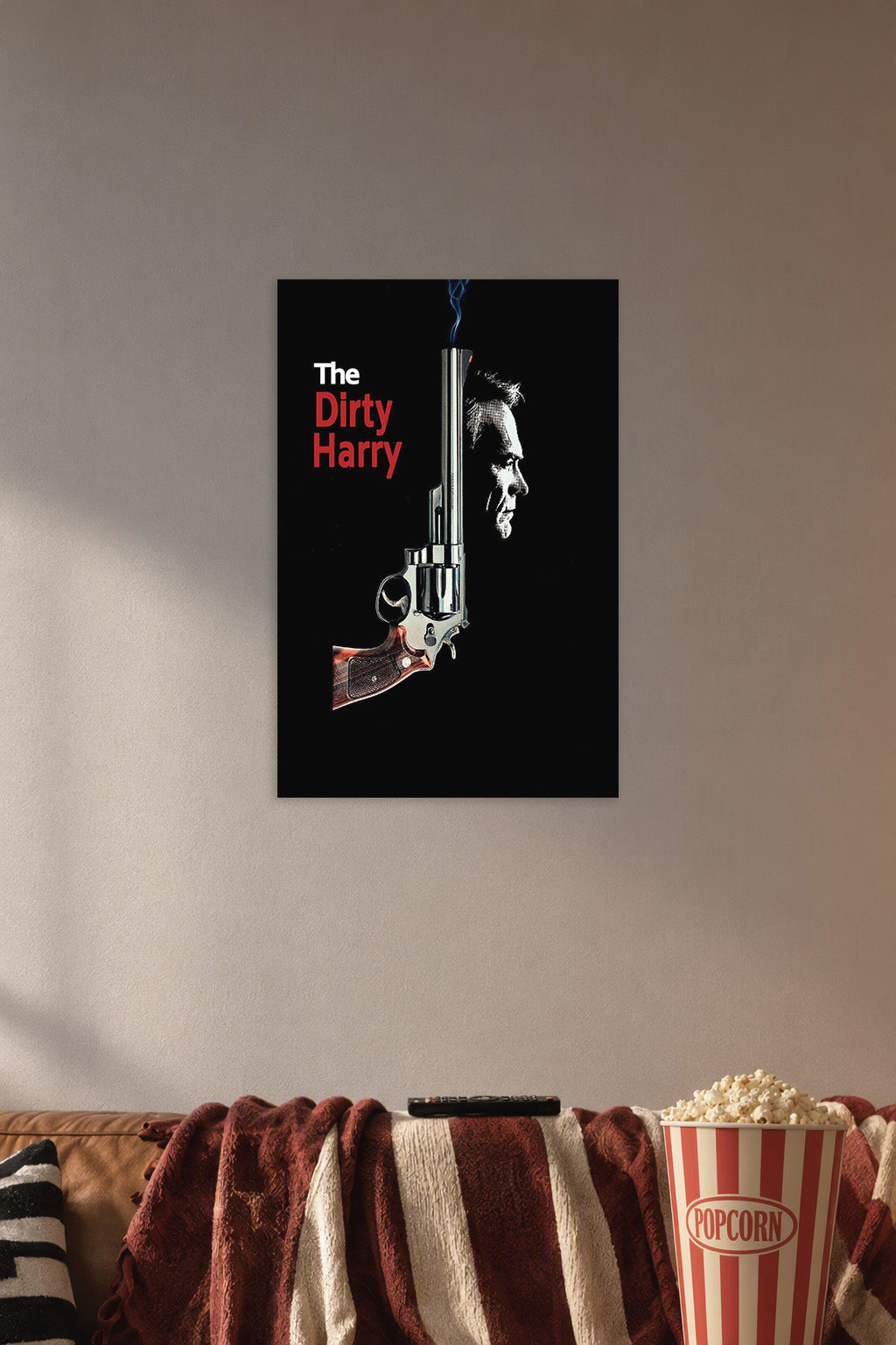 Dirty Harry Movie in a cozy movie room above a brown sofa with popcorn.