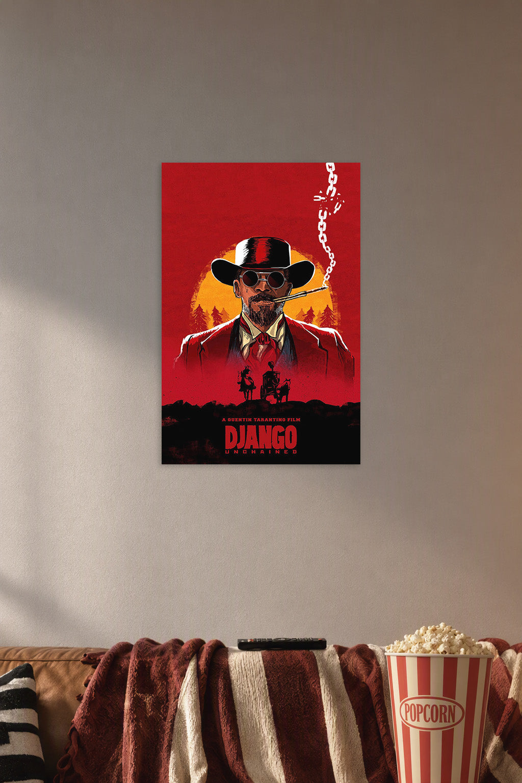 Django in a cozy movie room above a brown sofa with popcorn.