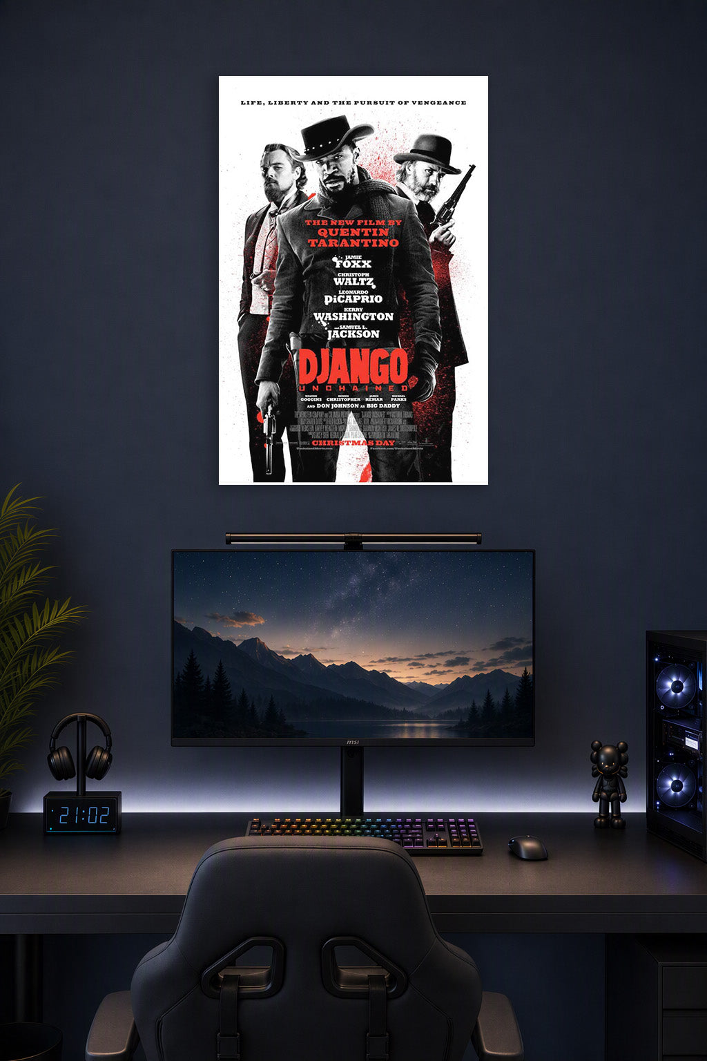 Django Unchained Movie Poster in a gaming desk setup above a monitor.
