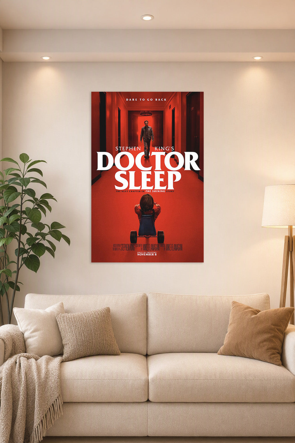 Doctor Sleep Movie in a bright living room above a beige sofa.