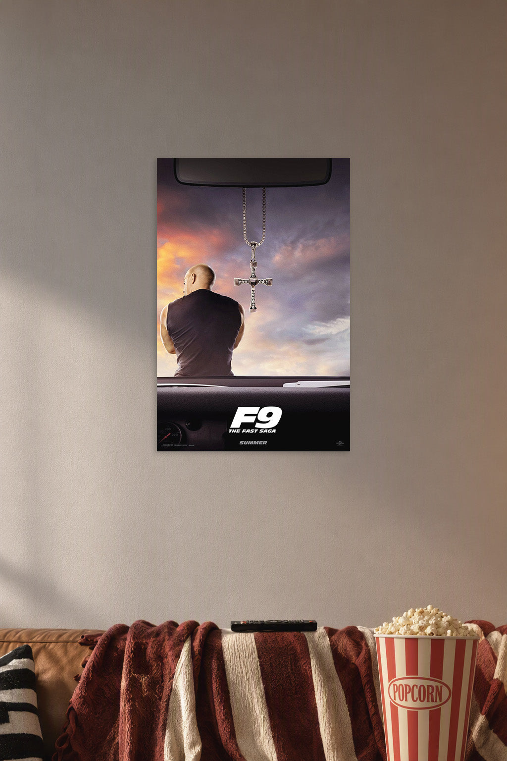 Dominick Toretto Fast & Furious in a cozy movie room above a brown sofa with popcorn.