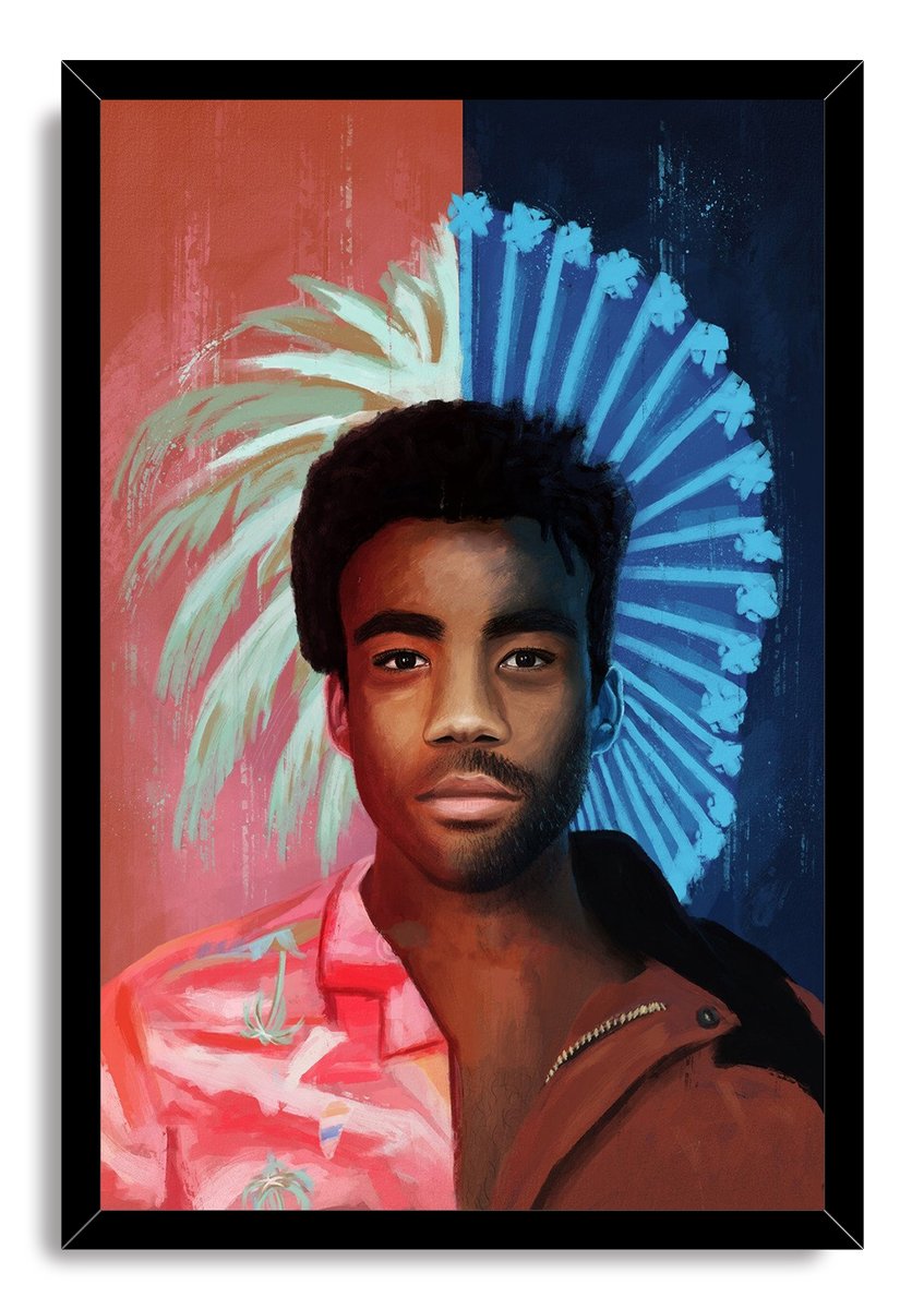Donald Glover framed wall art print with a black border, painted pink jacket, and radiant blue and cream brushwork behind him.