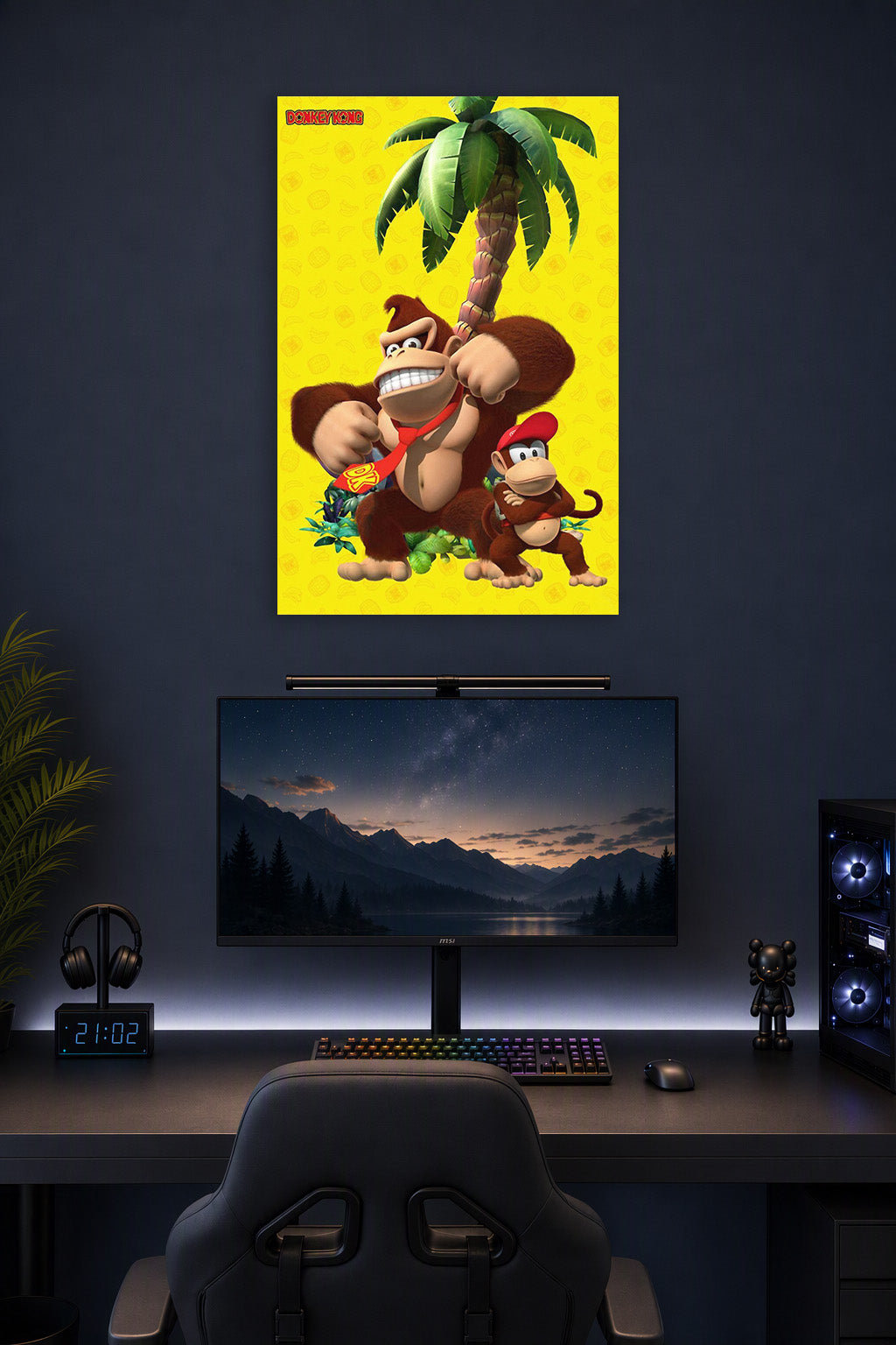 Donkey Kong and Diddy Kong in a gaming desk setup above a monitor.