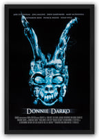 Donnie Darko framed wall art print presents a blue skull-like collage of faces and raised arms on a black field.