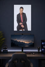 Donny Osmond in a gaming desk setup above a monitor.