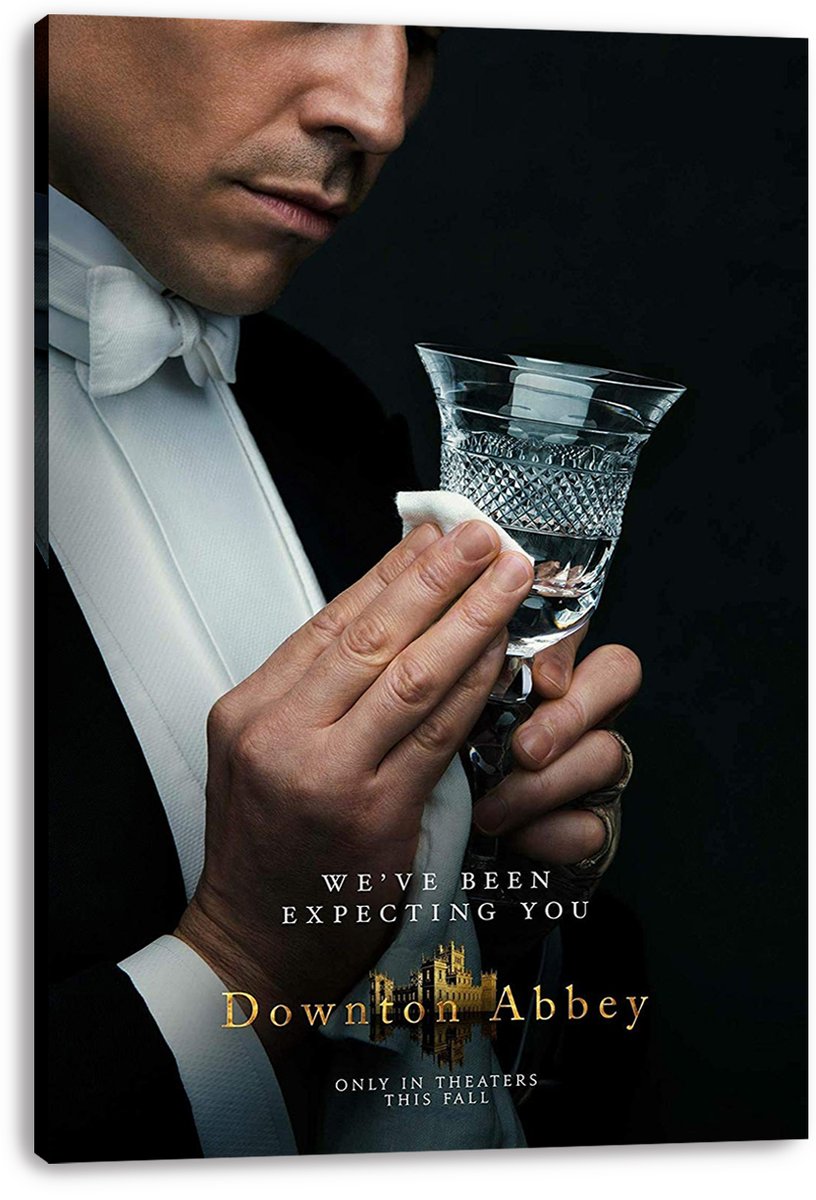 Downton Abbey canvas wall art print displays a close-up of a white-tied butler polishing a crystal goblet, with the gold film title below.
