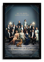 Downton Abbey framed wall art print presents the period-costumed cast and golden dog beneath the words “We’ve Been Expecting You.