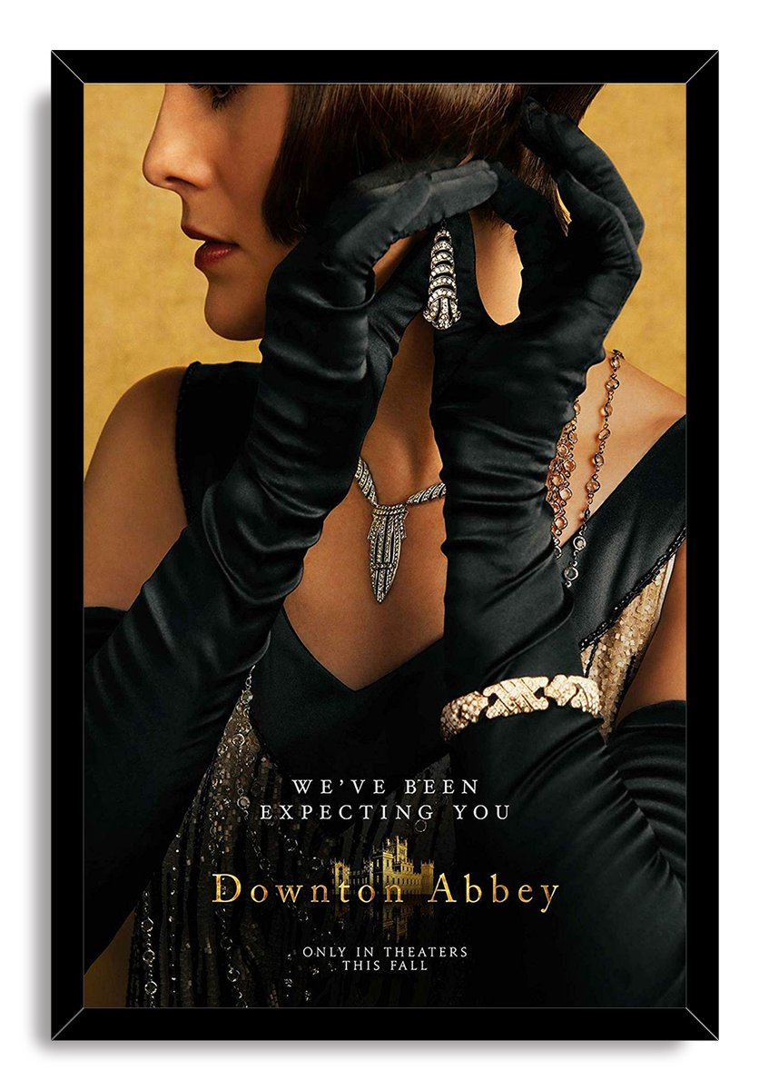 Downton Abbey framed wall art print features a woman in black gloves and jeweled accessories, bordered by a black frame.