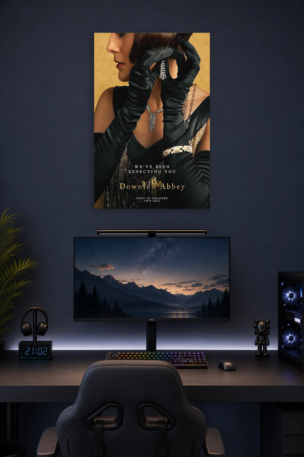 Downton Abbey Elegant Woman in a gaming desk setup above a monitor.