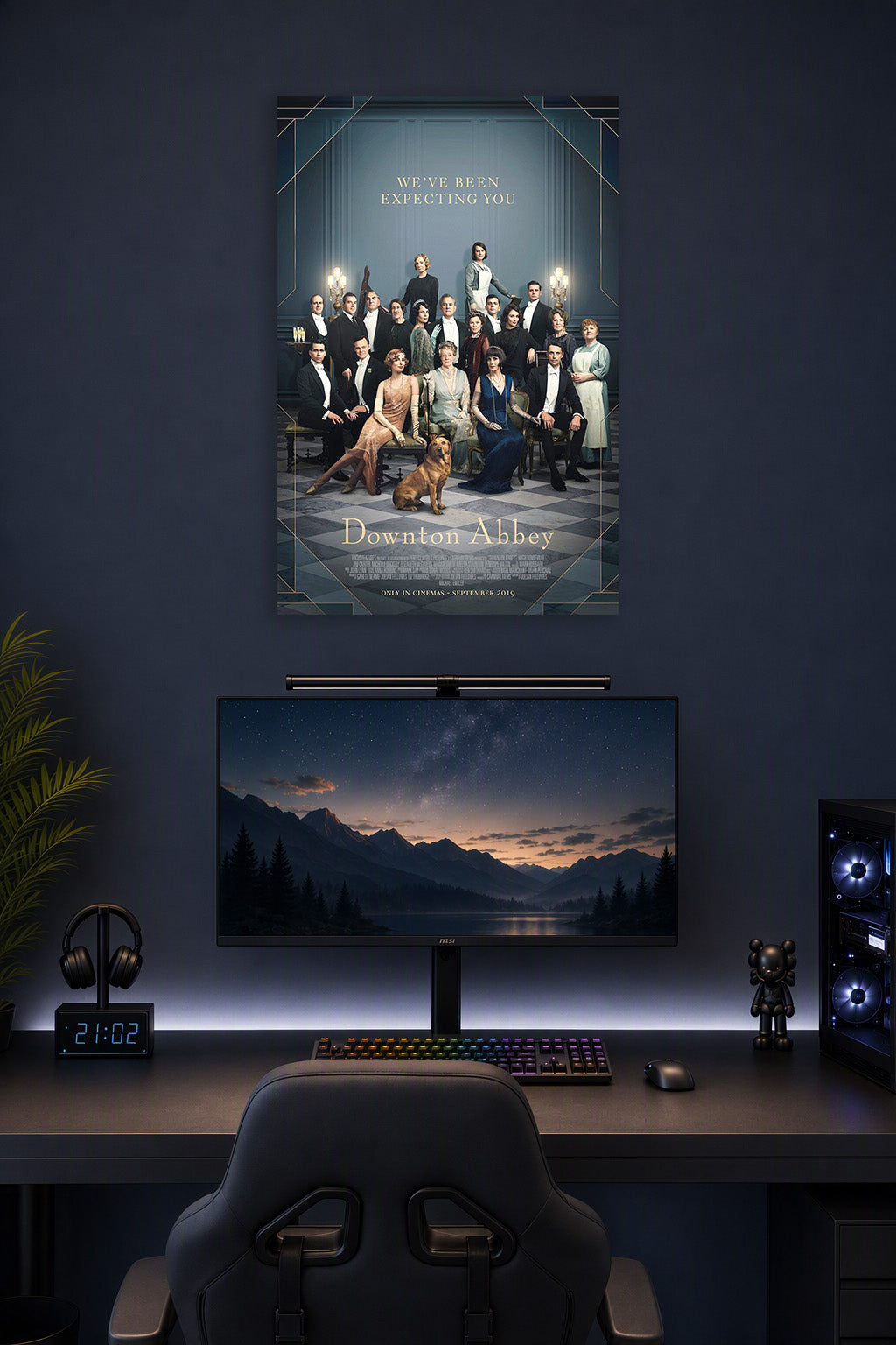 Downton Abbey Movie in a gaming desk setup above a monitor.
